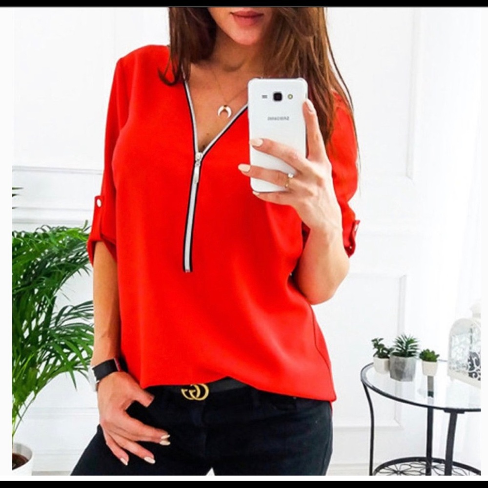 Red zip front top. NWOT